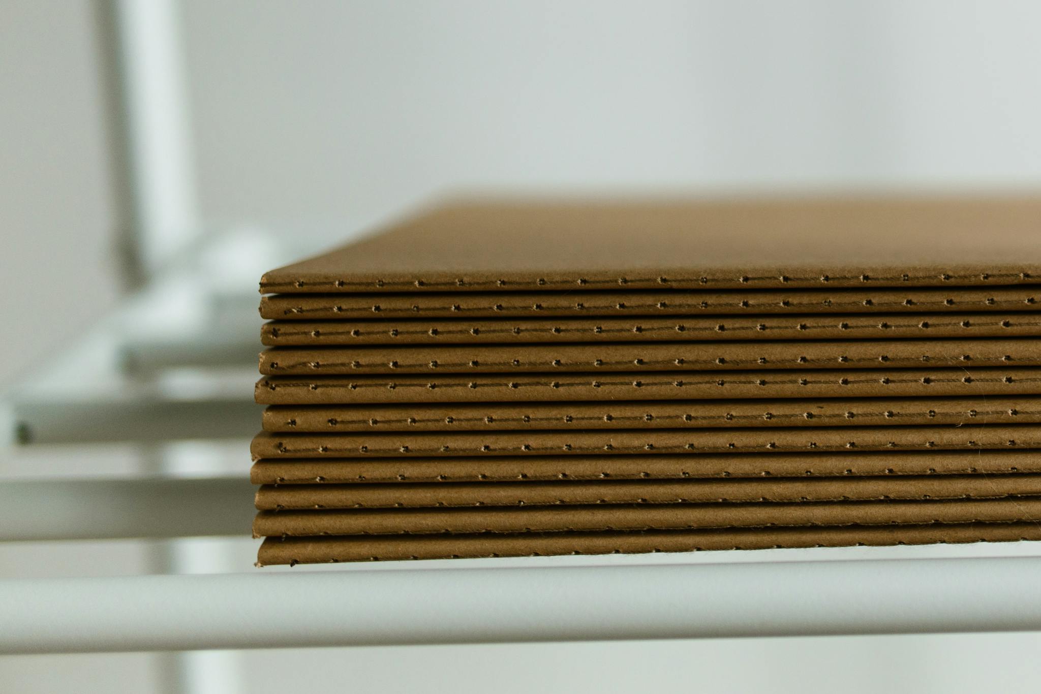 Close Up View Of Neatly Arranged Stacked Cardboard